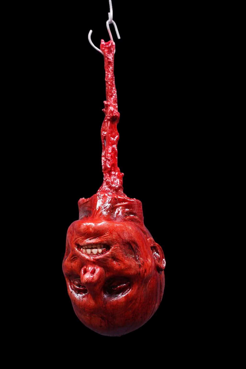 Hanging Skinned Luttra Head Halloween Prop