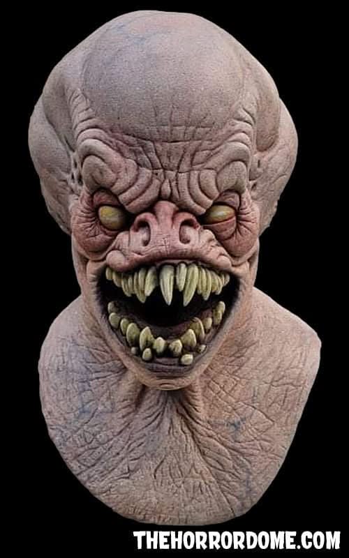 Hell Beast Halloween mask from HD Studios Pro Mask collection. Hyper-realistic movie-quality silicone facial disguise as terrifying horned demon. Features hand-painted grotesque details, realistic hair, disturbing pale skin tones. Created with advanced silicone for comfortable all-night wear. Perfect centerpiece for haunted house costumes and terrorizing victims.