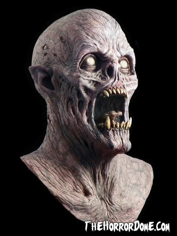 Close-up view of Demon Lord's razor-sharp teeth and undead eyes