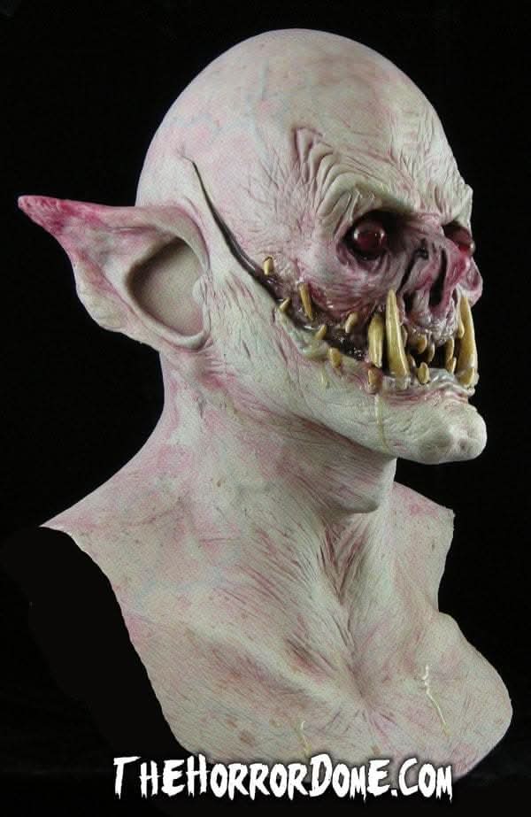 Close-up of blood-filled bulbous eyes and fanged mouth of the Demon Vampire Mask