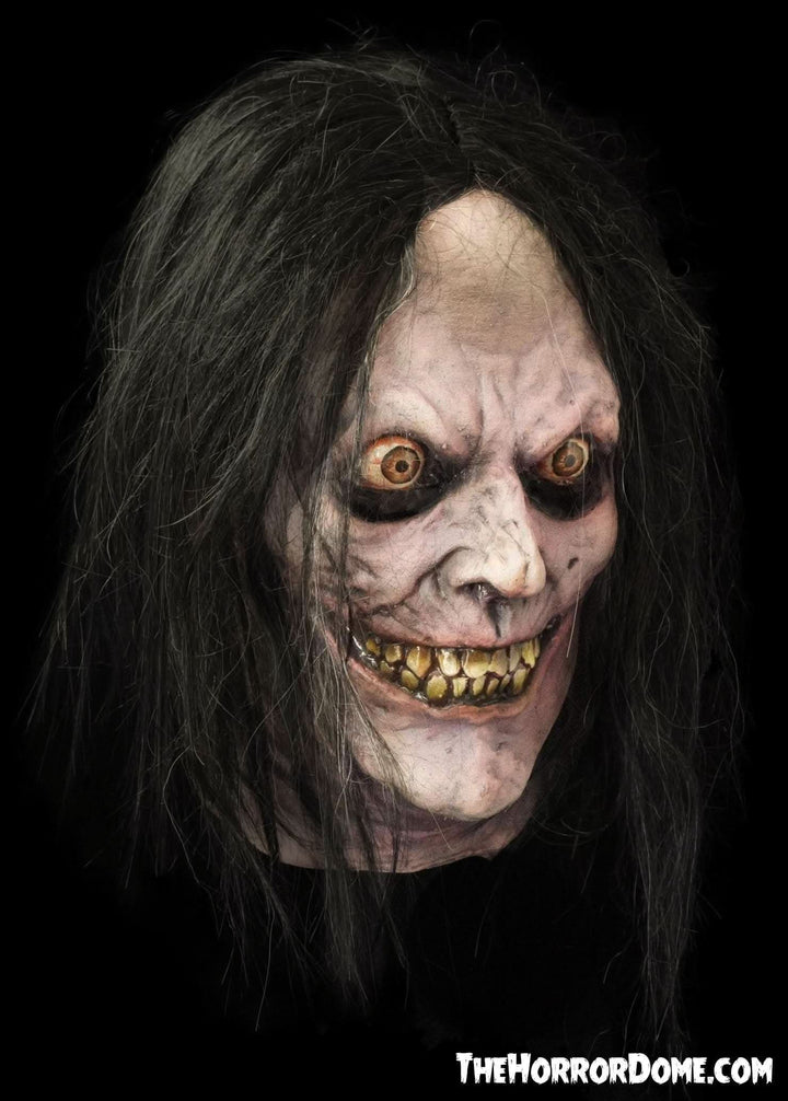 Psycho Halloween mask from HD Studios Pro. Hand-painted latex mask inspired by iconic thriller villain. Features intricate details like disturbing grin and deep eye shadows for hyper-realistic look. Durable latex construction provides comfortable all-night wear. Perfect for delivering chilling scares at haunted houses and Halloween events.