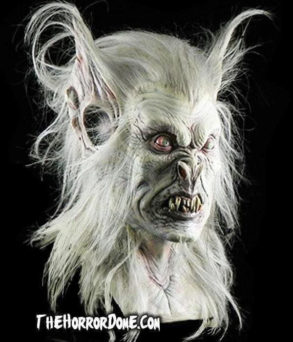 Close-up of hand-painted, hair-laid Vampire Wolf mask details