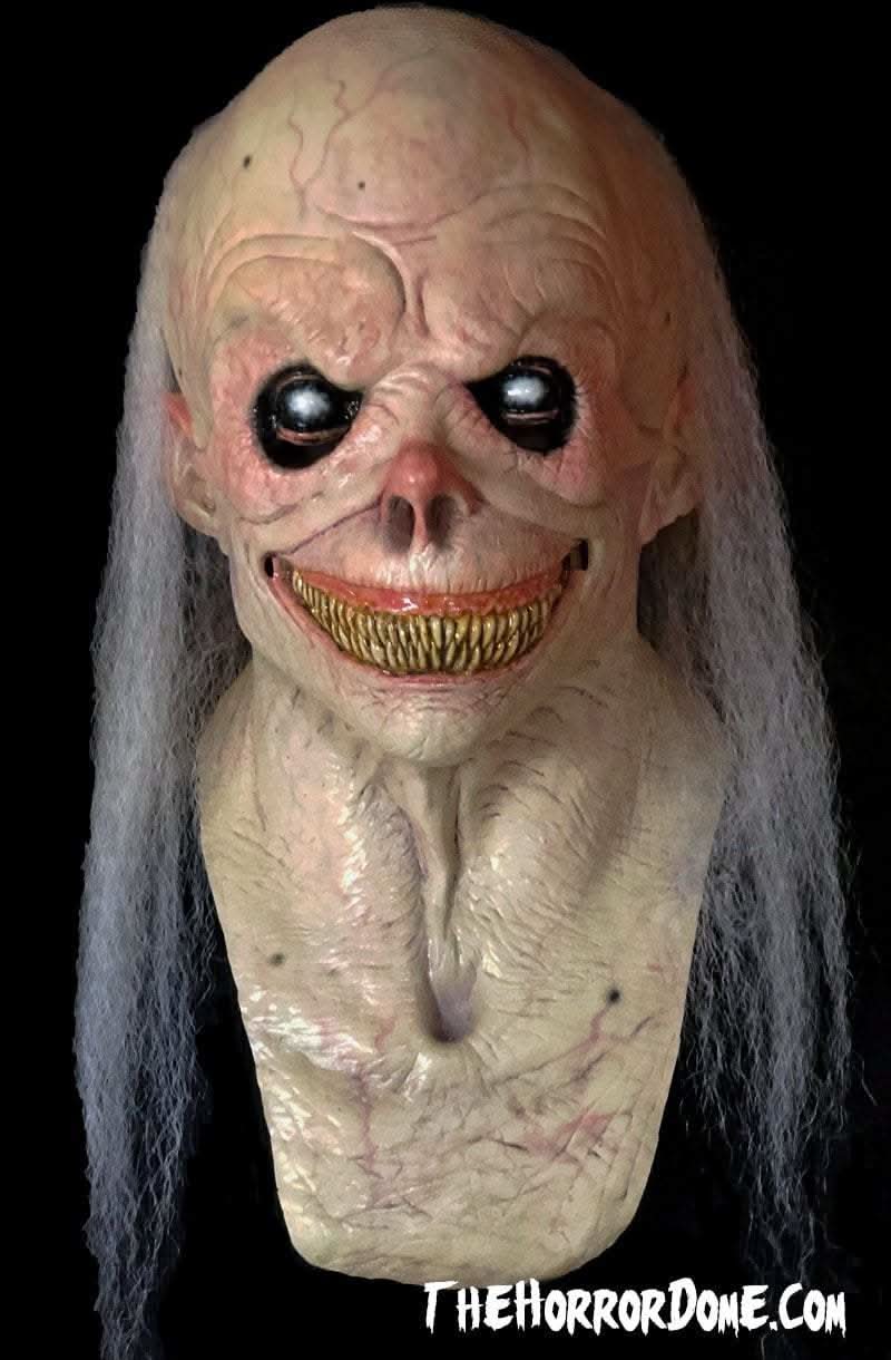 Uncle Fester Halloween Mask from HD Studios Pro. Hand-painted gruesome madman disguise with realistic hair and pale skin. Durable construction perfect for freak shows and haunts. Collector's quality mask intricately detailed for movie-level realism. Guaranteed to terrorize trick-or-treaters.