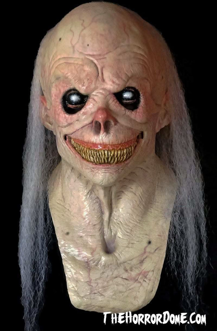 Uncle Fester Halloween Mask from HD Studios Pro. Hand-painted gruesome madman disguise with realistic hair and pale skin. Durable construction perfect for freak shows and haunts. Collector's quality mask intricately detailed for movie-level realism. Guaranteed to terrorize trick-or-treaters.